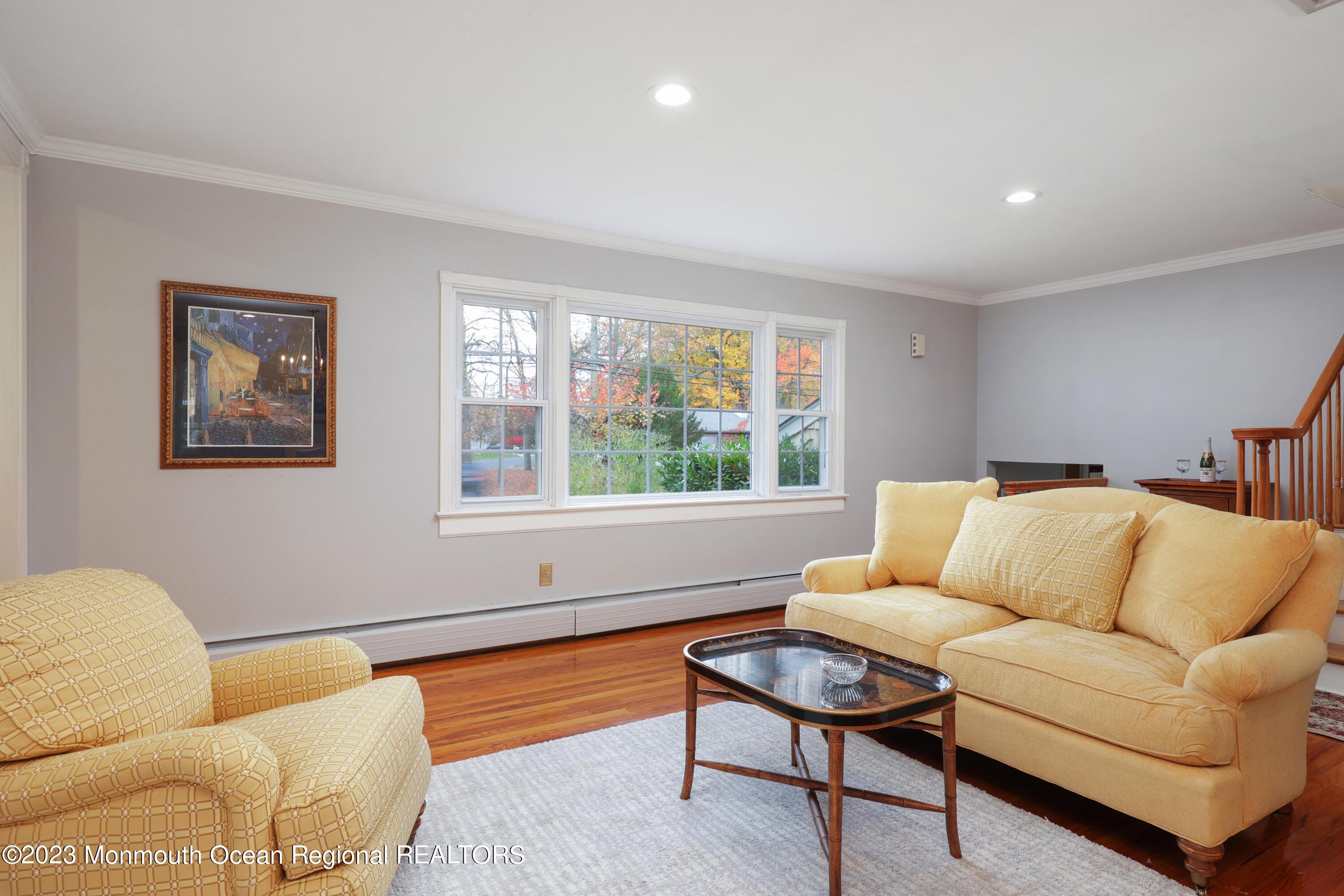 2600 Logan Road Asbury Park, NJ 07712 - Photo 6 of 36 a living room with furniture a rug and a window