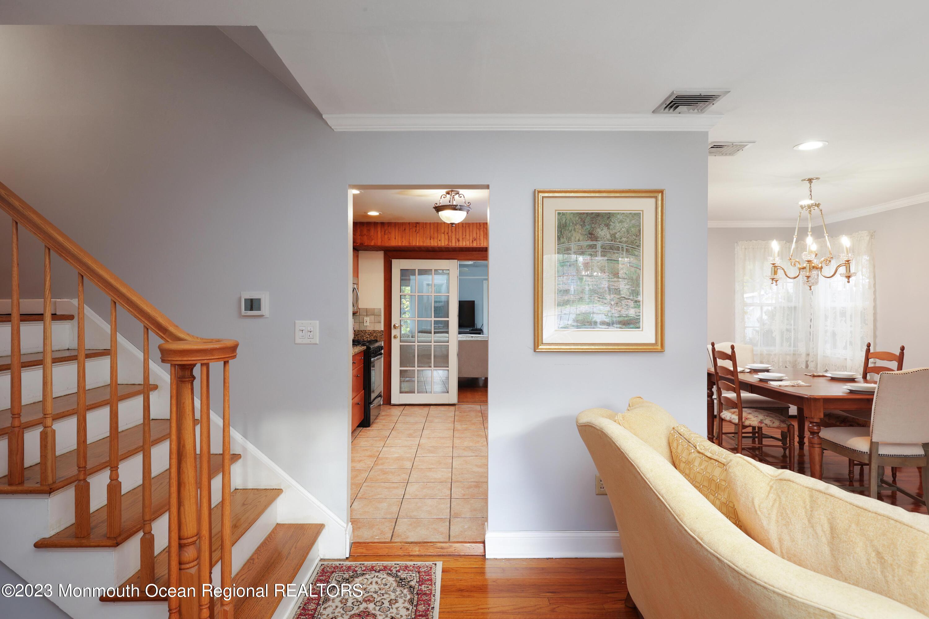 2600 Logan Road Asbury Park, NJ 07712 - Photo 7 of 36 a living room with furniture and large windows