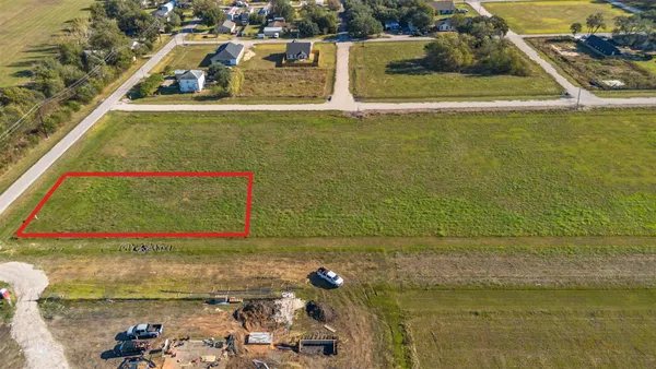 a view of swimming pool with a yard and seating area