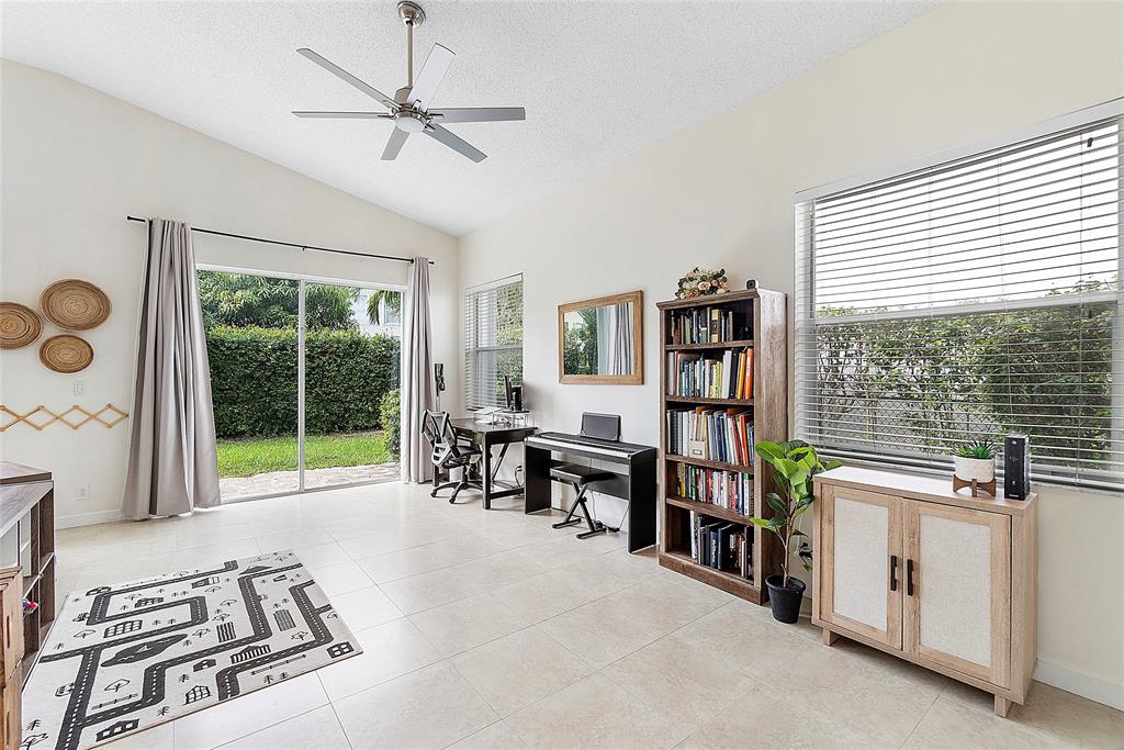 10650 Northwest 48th Street Coral Springs, FL 33076 - Photo 14 of 37 a work room with furniture and a large window