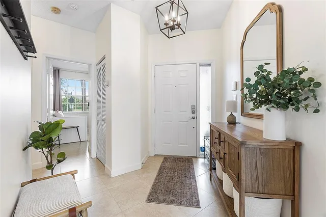 a view of entryway with wooden floor