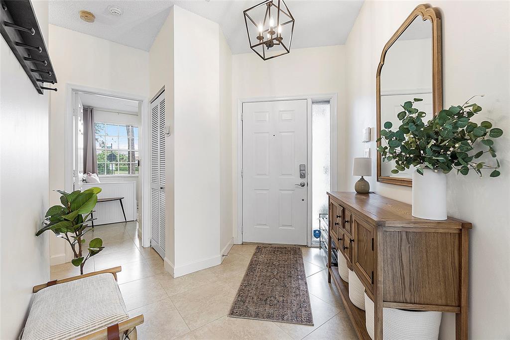 10650 Northwest 48th Street Coral Springs, FL 33076 - Photo 24 of 37 a view of entryway with wooden floor