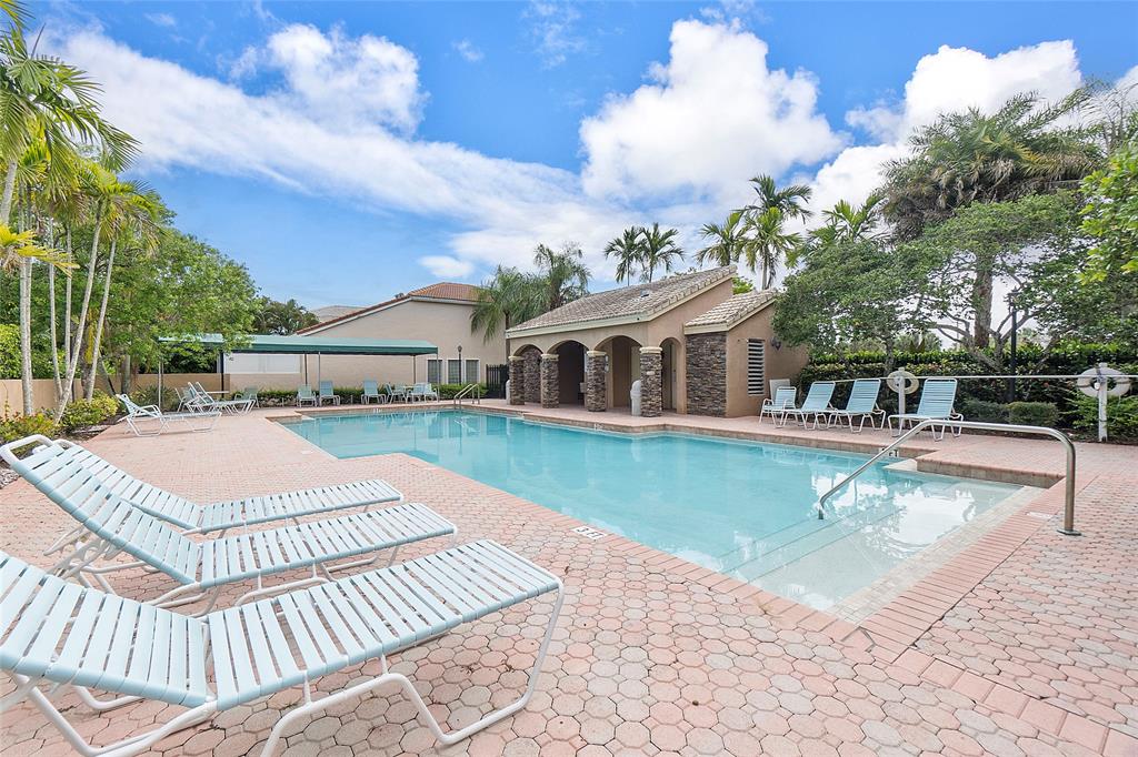 10650 Northwest 48th Street Coral Springs, FL 33076 - Photo 36 of 37 a view of a house with pool