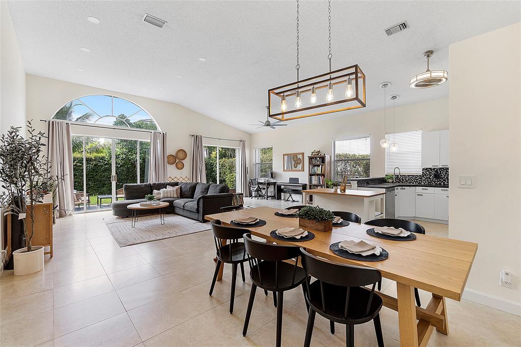 10650 Northwest 48th Street Coral Springs, FL 33076 - Photo 5 of 37 a view of a dining room with furniture window and outside view