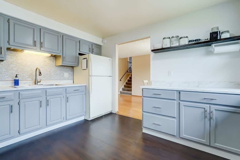 195 Kings Gate North Irondequoit, NY 14617 - Photo 11 of 49 Wonderfully updated kitchen with refinished cabine