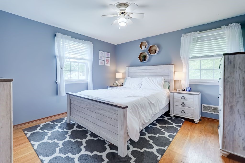 195 Kings Gate North Irondequoit, NY 14617 - Photo 15 of 49 Fabulous primary bedroom with hardwood flooring an
