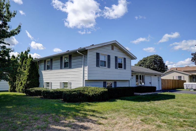 195 Kings Gate North Irondequoit, NY 14617 - Photo 3 of 49 With better than average side yard privacy and tim