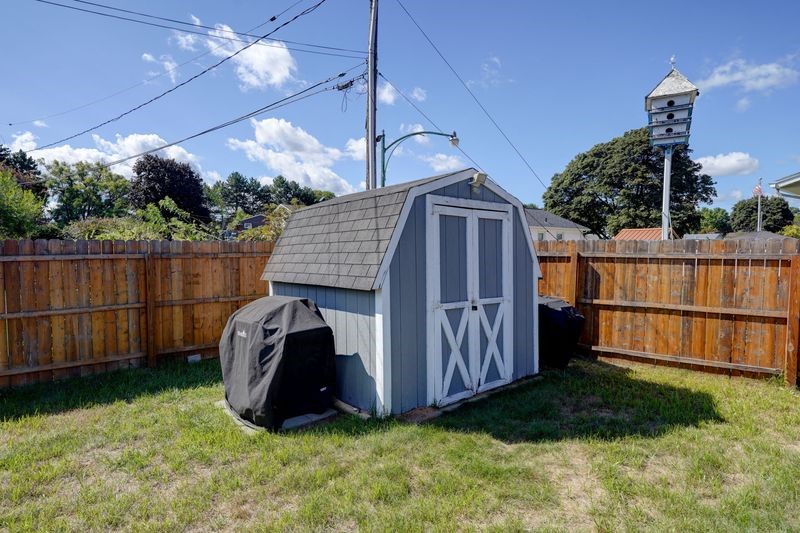 195 Kings Gate North Irondequoit, NY 14617 - Photo 38 of 49 Secure, water-tight shed tucked at the rear corner