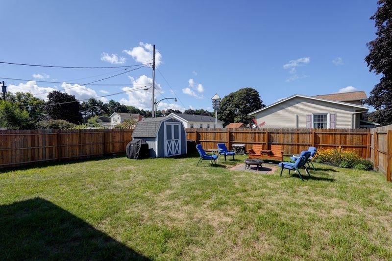 195 Kings Gate North Irondequoit, NY 14617 - Photo 42 of 49 An alternate perspective of the side yard from the