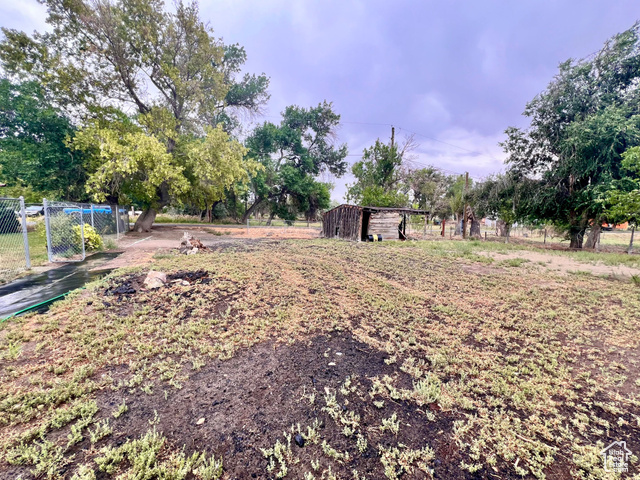 350 West Main Street Emery, UT 84522 - Photo 26 of 28 View of yard featuring a storage shed