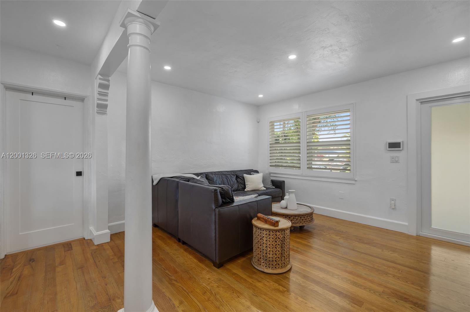 6382 Southwest 38th Street Miami, FL 33155 - Photo 11 of 41 a living room with furniture and a window