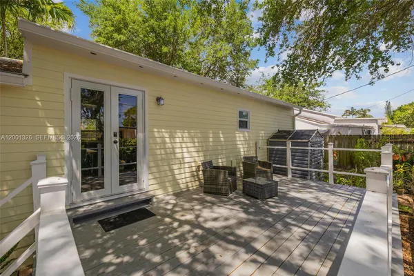 a front view of a house with patio