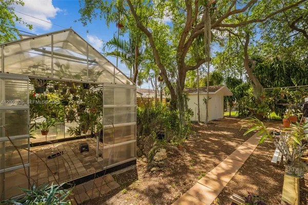 a view of entrance gate of a house