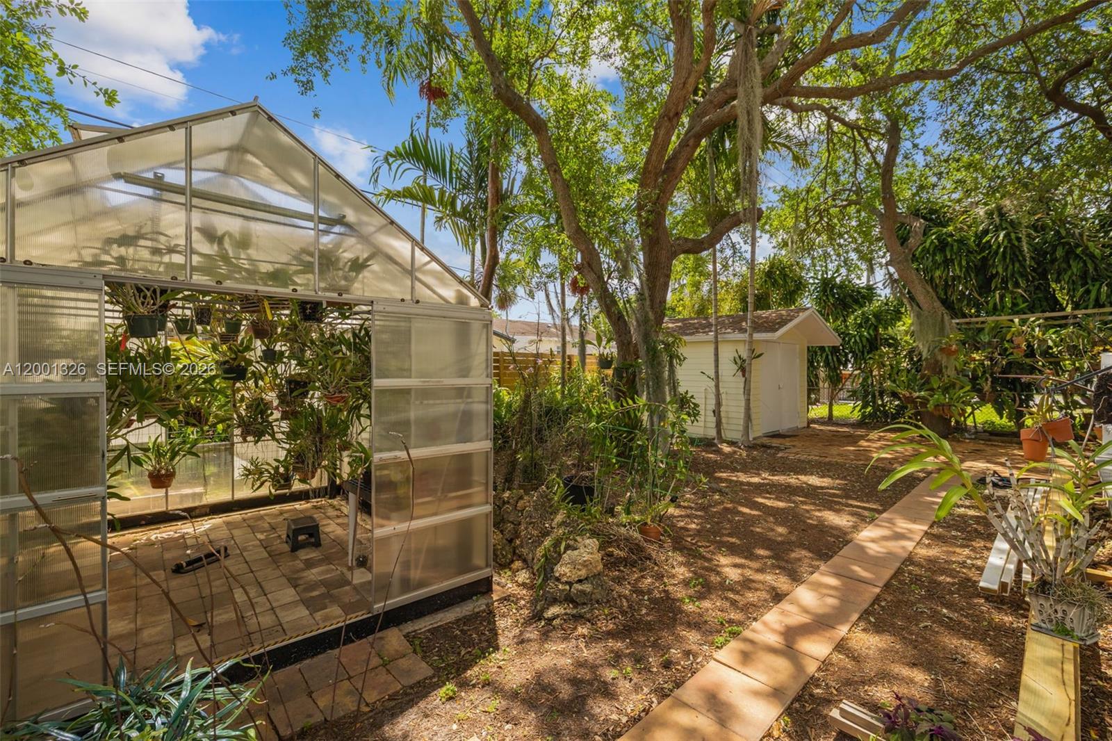 6382 Southwest 38th Street Miami, FL 33155 - Photo 33 of 41 a view of entrance gate of a house