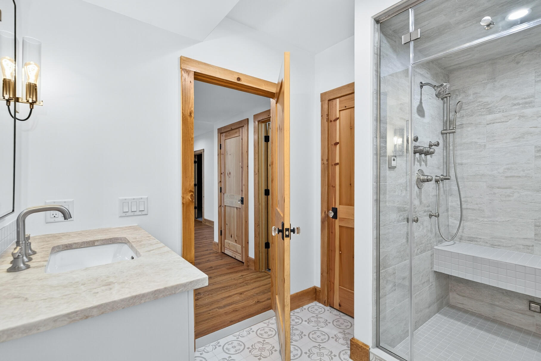 131 Timberlane Drive Mashpee, MA 02649 - Photo 49 of 57 a bathroom with a granite countertop sink mirror and shower