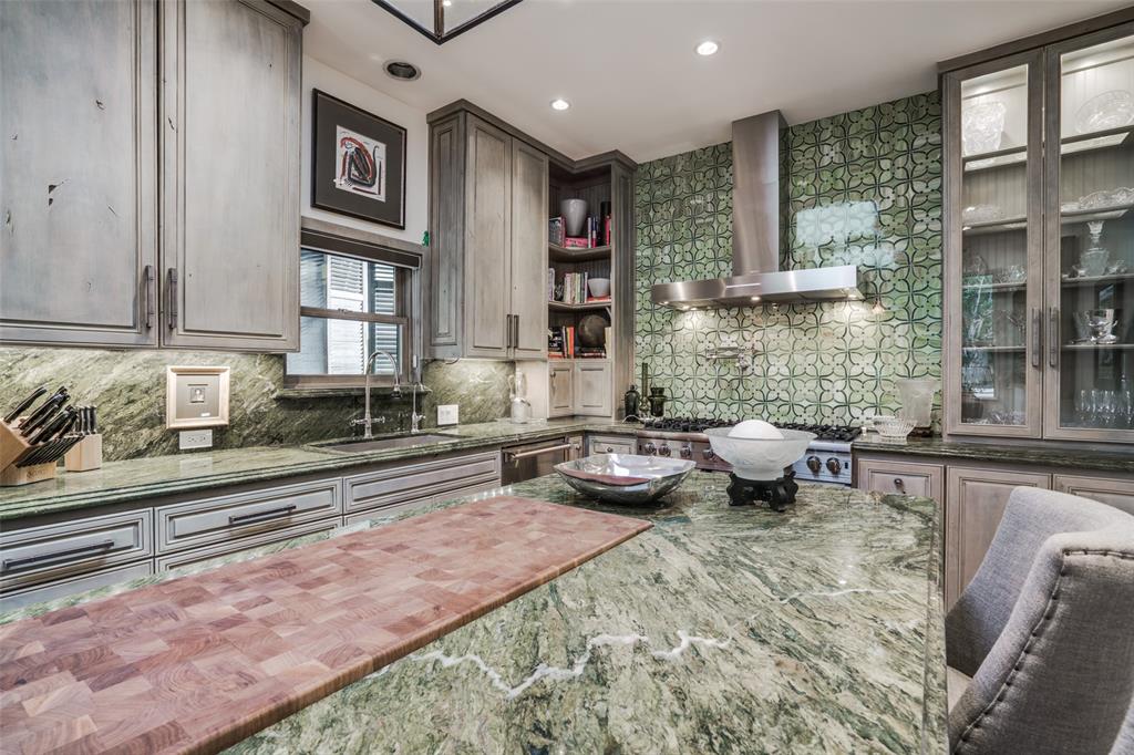 3610 Congress Avenue Dallas, TX 75219 - Photo 14 of 40 a kitchen with sink refrigerator and window