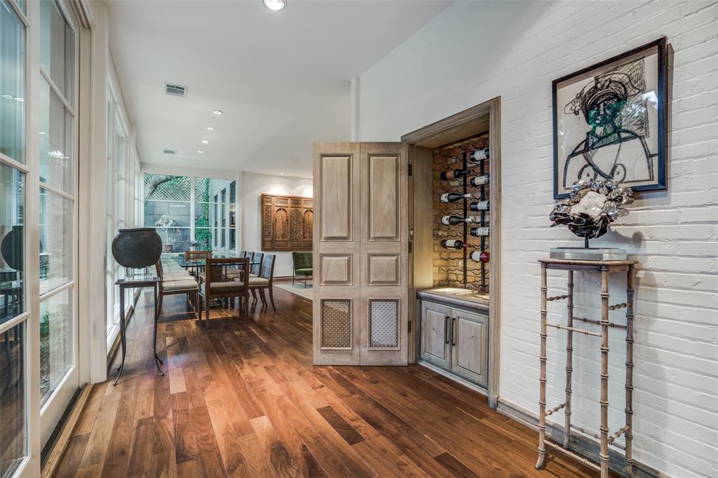 3610 Congress Avenue Dallas, TX 75219 - Photo 17 of 40 a view of a kitchen with furniture and wooden floor