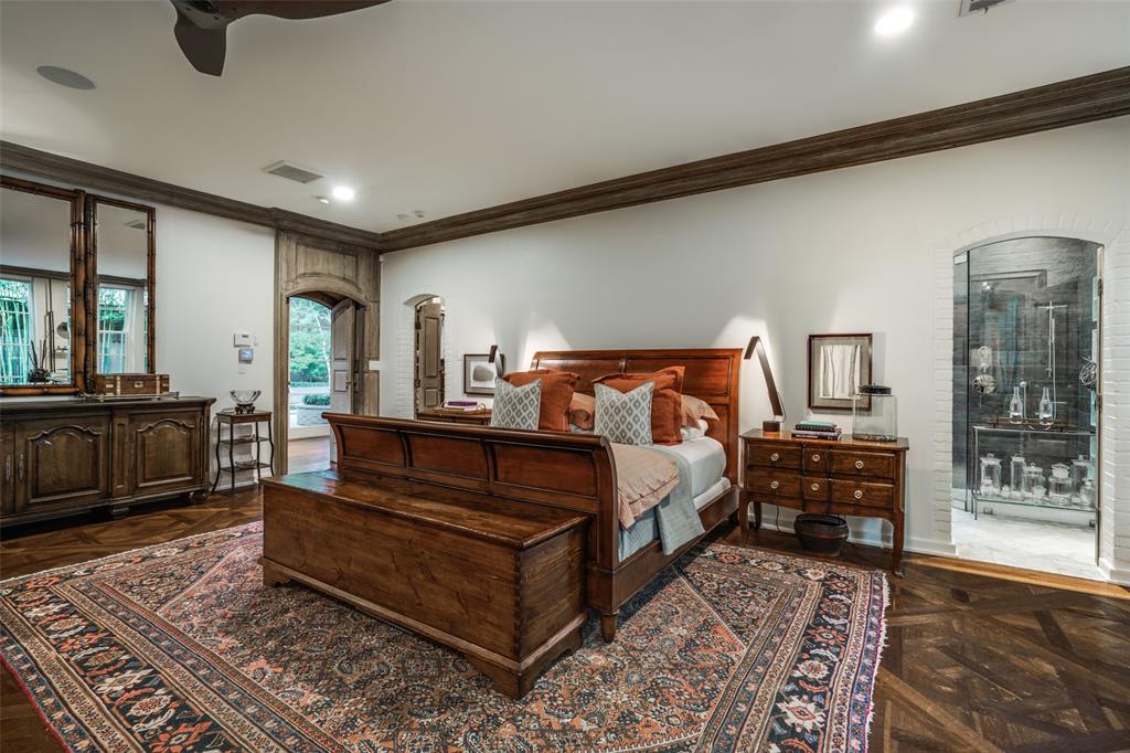 3610 Congress Avenue Dallas, TX 75219 - Photo 23 of 40 a bedroom with furniture and wooden floor