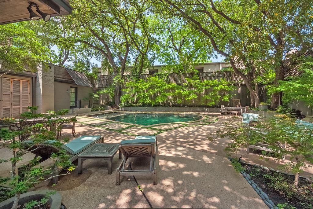 3610 Congress Avenue Dallas, TX 75219 - Photo 40 of 40 a backyard of a house with yard and outdoor seating