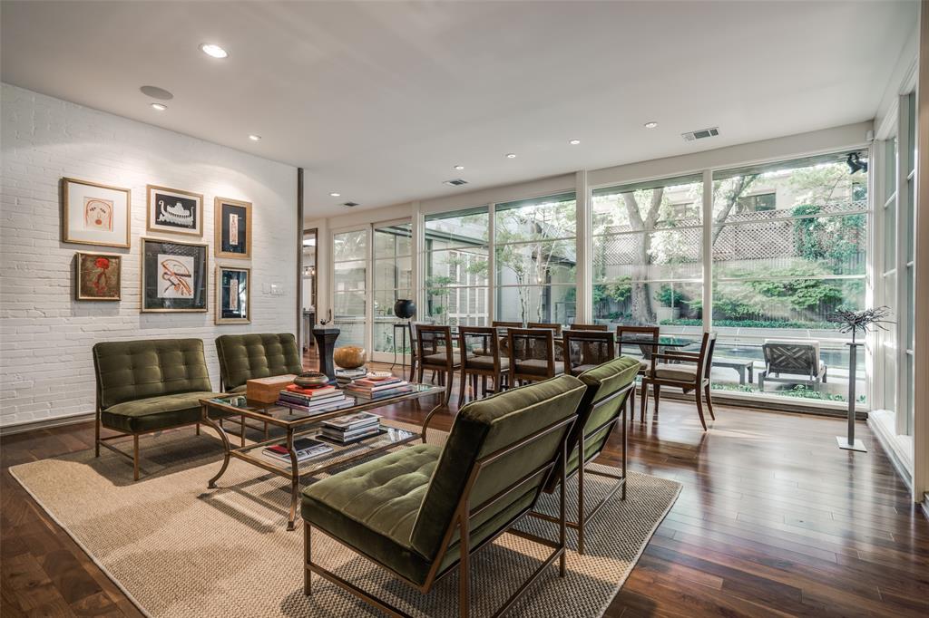 3610 Congress Avenue Dallas, TX 75219 - Photo 5 of 40 a living room with furniture and a large window with balcony view