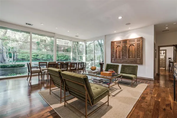 a outdoor space with furniture and large windows