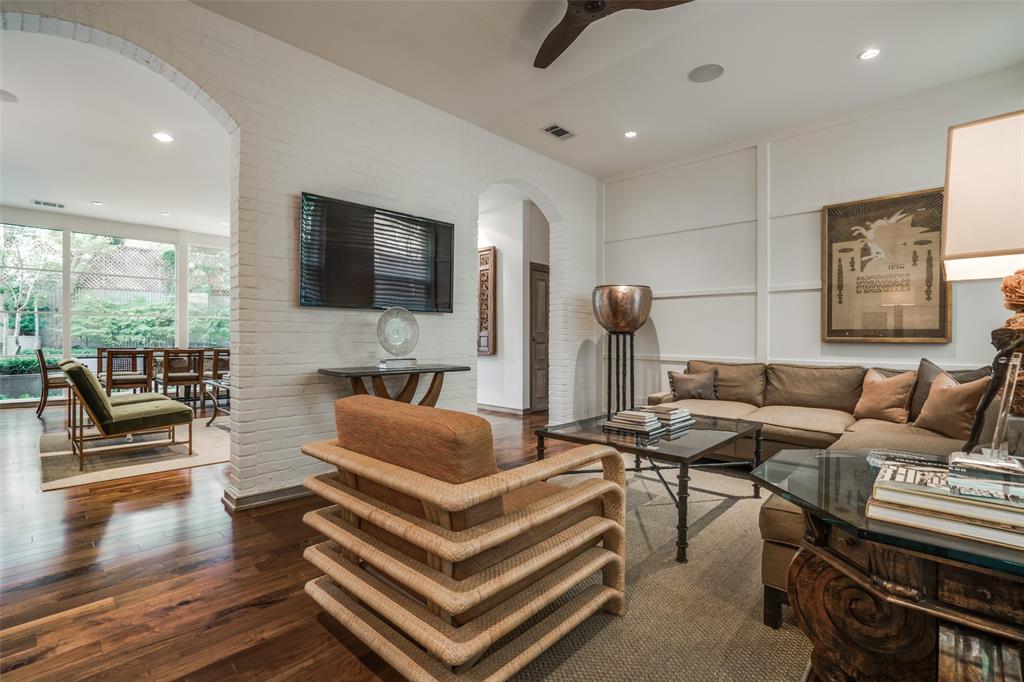 3610 Congress Avenue Dallas, TX 75219 - Photo 9 of 40 a living room with furniture and a flat screen tv
