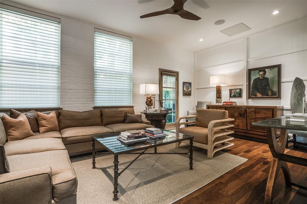 3610 Congress Avenue Dallas, TX 75219 - Photo 10 of 40 a living room with furniture and a flat screen tv