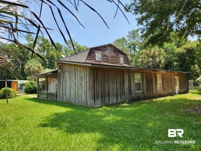32749 Antietam Road Lillian, AL 36549 - Photo 4 of 47 Exterior space with a yard