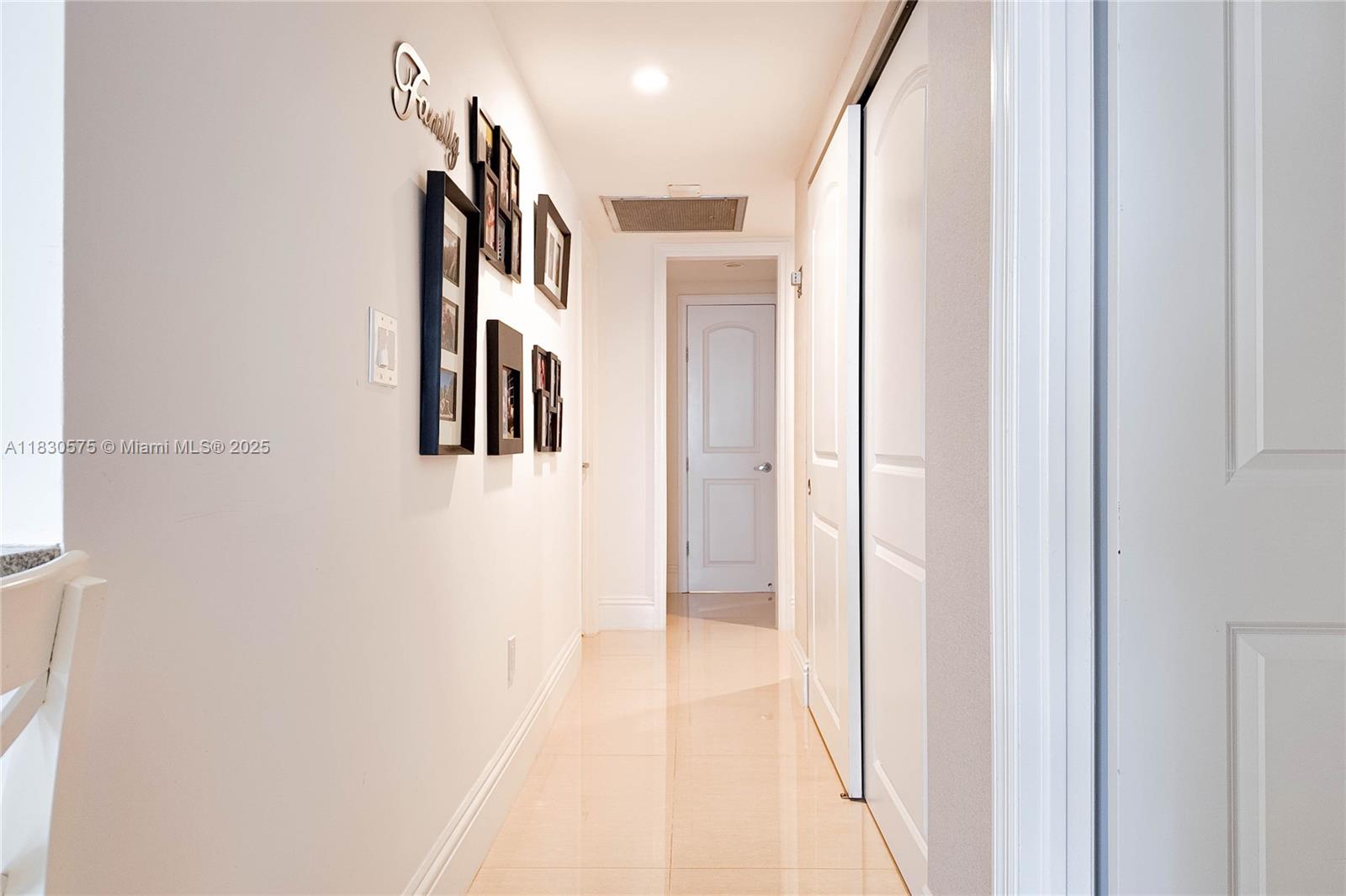 1950 South Ocean Drive, Unit 4E Hallandale Beach, FL 33009 - Photo 14 of 33 a view of a hallway with a white walls
