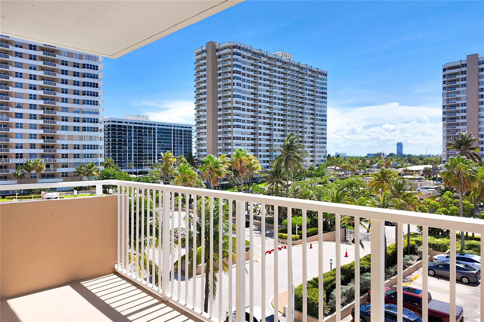 1950 South Ocean Drive, Unit 4E Hallandale Beach, FL 33009 - Photo 32 of 33 a view of a balcony with wooden floor and fence