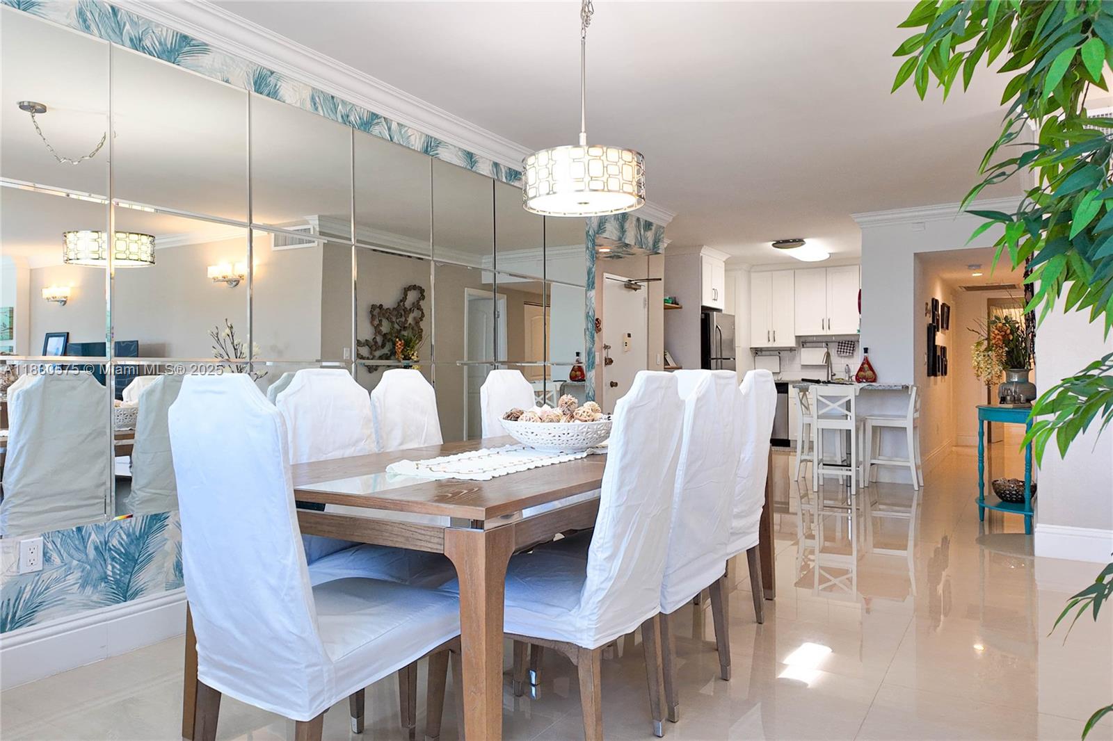 1950 South Ocean Drive, Unit 4E Hallandale Beach, FL 33009 - Photo 6 of 33 a view of a dining room with furniture and wooden floor