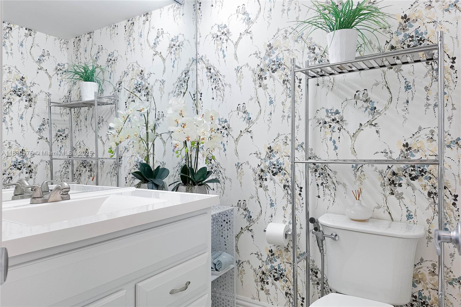 1950 South Ocean Drive, Unit 4E Hallandale Beach, FL 33009 - Photo 9 of 33 a bathroom with a sink and toilet