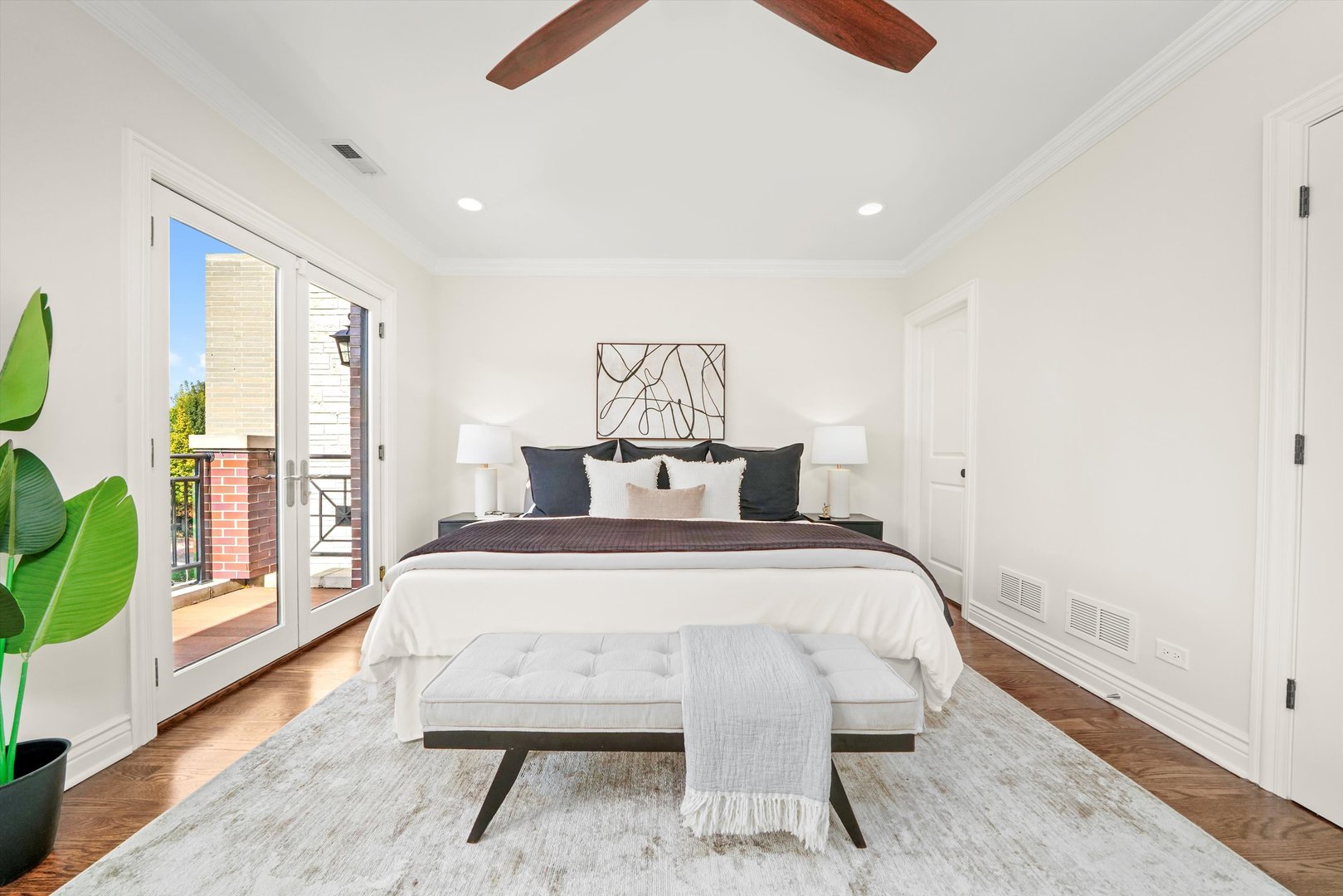 2953 North Honore Street Chicago, IL 60657 - Photo 13 of 40 a bedroom with a bed and wooden floor