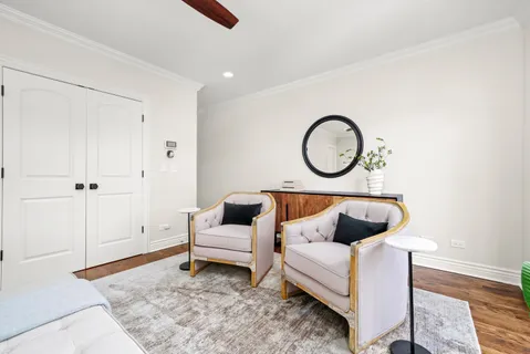 a spacious bathroom with a double vanity sink mirror and shower