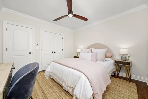 a view of backyard with seating space and trees