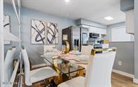833 Riverside Drive, Unit 835 Coral Springs, FL 33071 - Photo 18 of 25 a living room with stainless steel appliances furniture and a kitchen view
