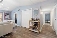 833 Riverside Drive, Unit 835 Coral Springs, FL 33071 - Photo 6 of 25 a very nice looking room with a large mirror