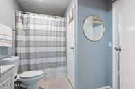 833 Riverside Drive, Unit 835 Coral Springs, FL 33071 - Photo 8 of 25 a bathroom with a toilet and a sink
