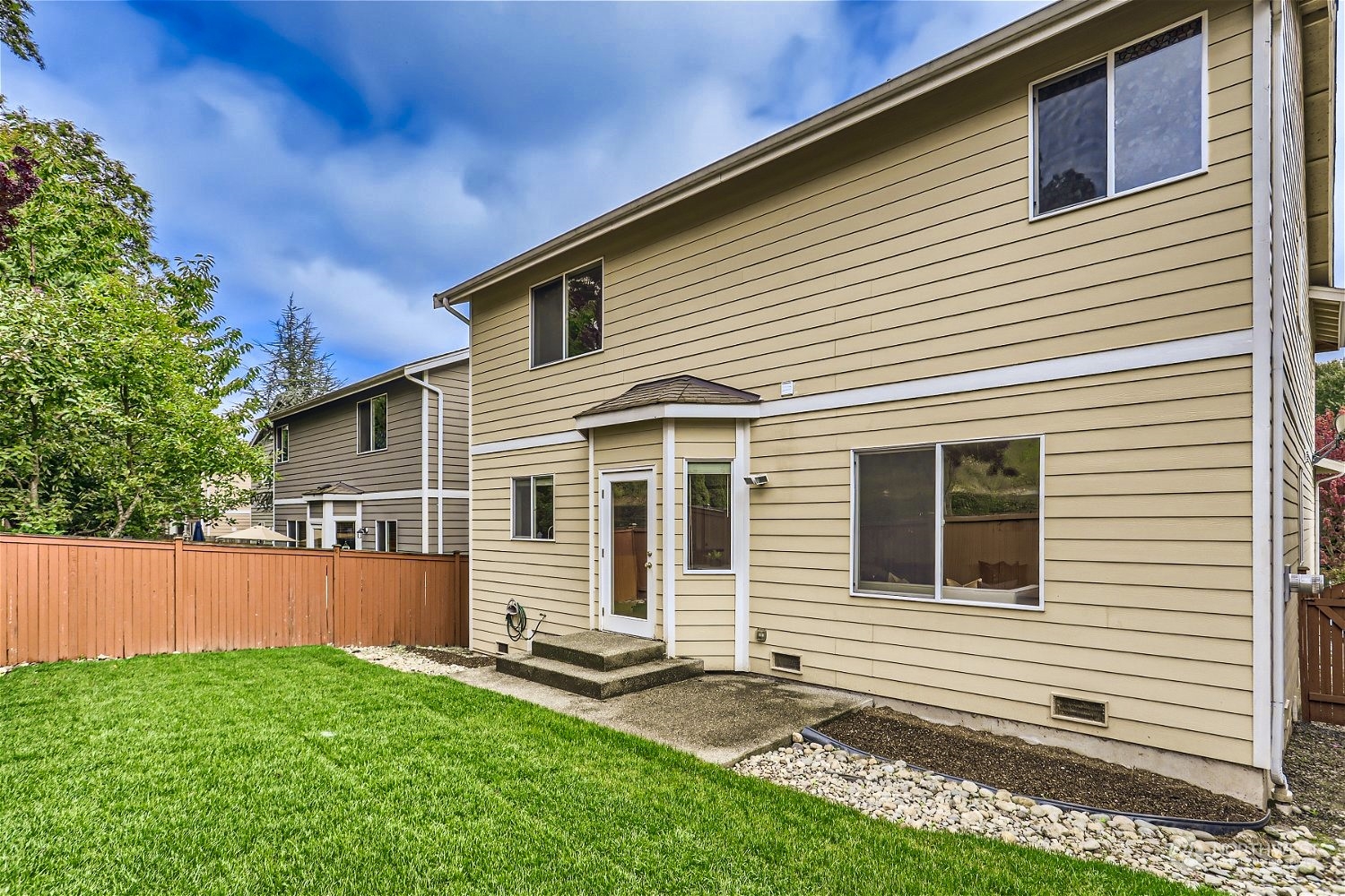 23816 17th Place West Bothell, WA 98021 - Photo 28 of 29 a front view of a house with a yard