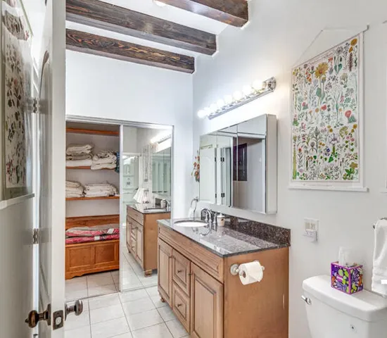 a kitchen with a sink and cabinets