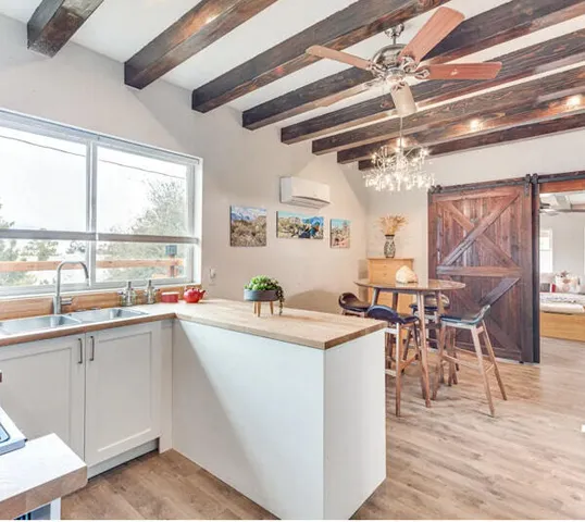 a view of a kitchen and electric equipment