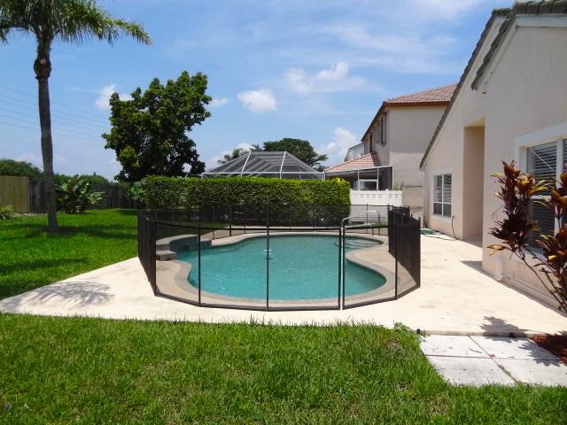 12292 St Simon Drive Boca Raton, FL 33428 - Photo 13 of 15 CHILD FENCE AROUND POOL