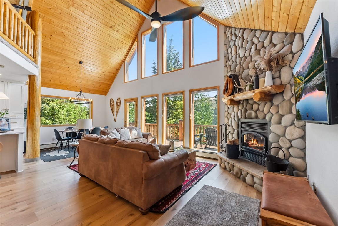 1375 Roberts Road Alma, CO 80420 - Photo 4 of 50 Living room with wooden ceiling, high vaulted ceiling, healthy amount of natural light, light wood-style flooring, and ceiling fan