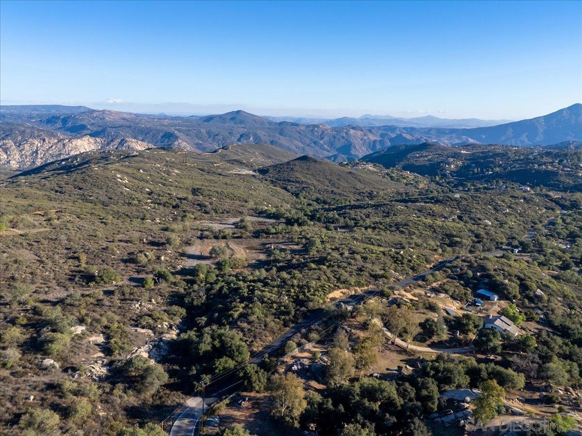 0 Valley Road, Unit A72 Jamul, CA 91935 - Photo 14 of 17 an aerial view of mountain with residential house in middle of the background