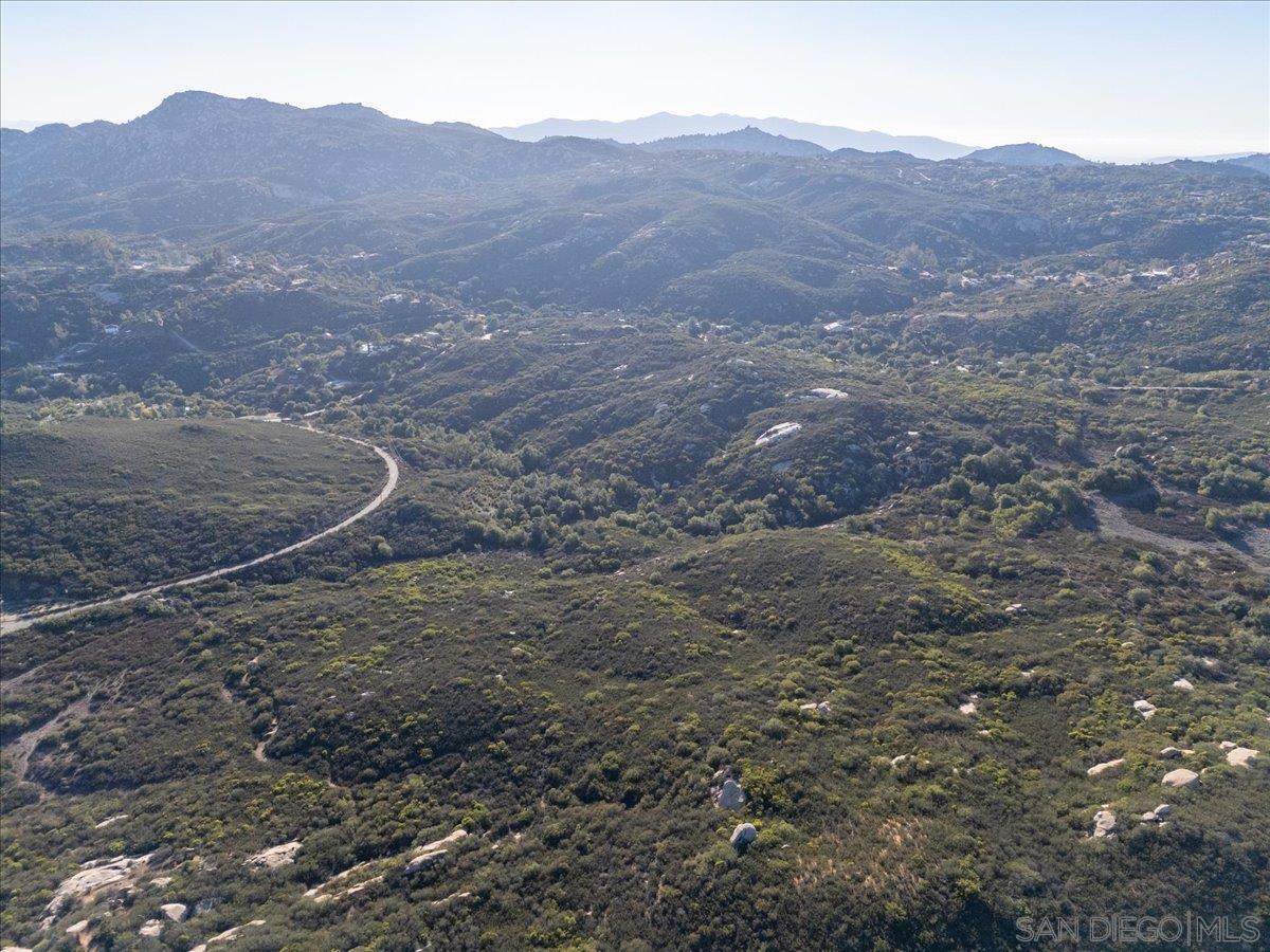 0 Valley Road, Unit A72 Jamul, CA 91935 - Photo 6 of 17 a view of a dry yard with mountains in the background