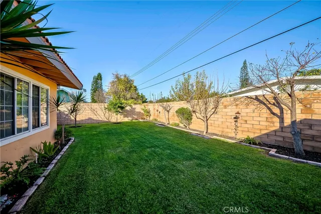 a view of a backyard with garden