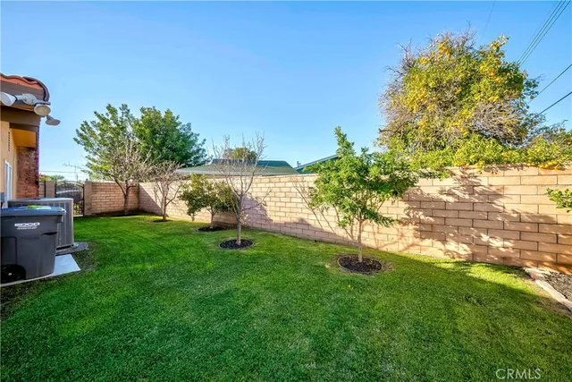 a view of a garden with a fountain