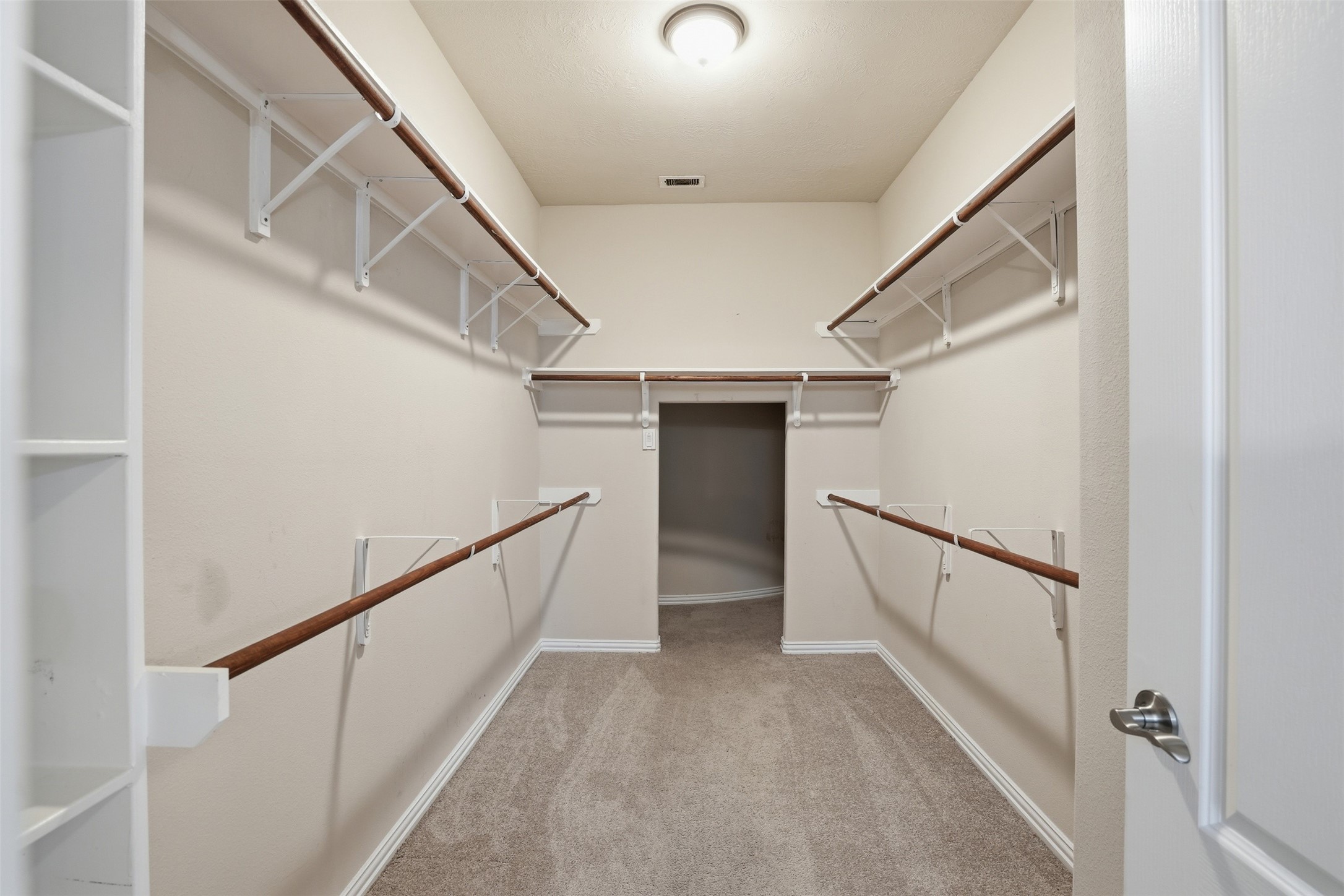 811 River Delta Lane Rosenberg, TX 77469 - Photo 17 of 35 First floor primary bedroom close has extra space towards the back.