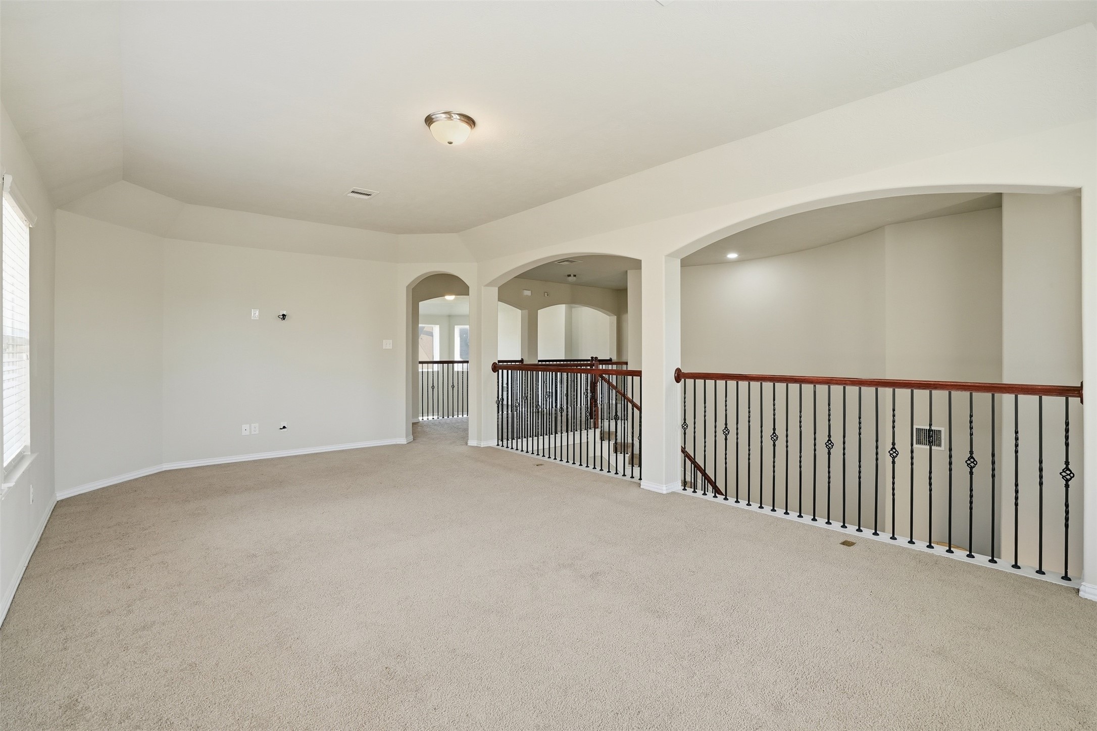 811 River Delta Lane Rosenberg, TX 77469 - Photo 21 of 35 Loft over looks first floor and connects surrounding rooms.