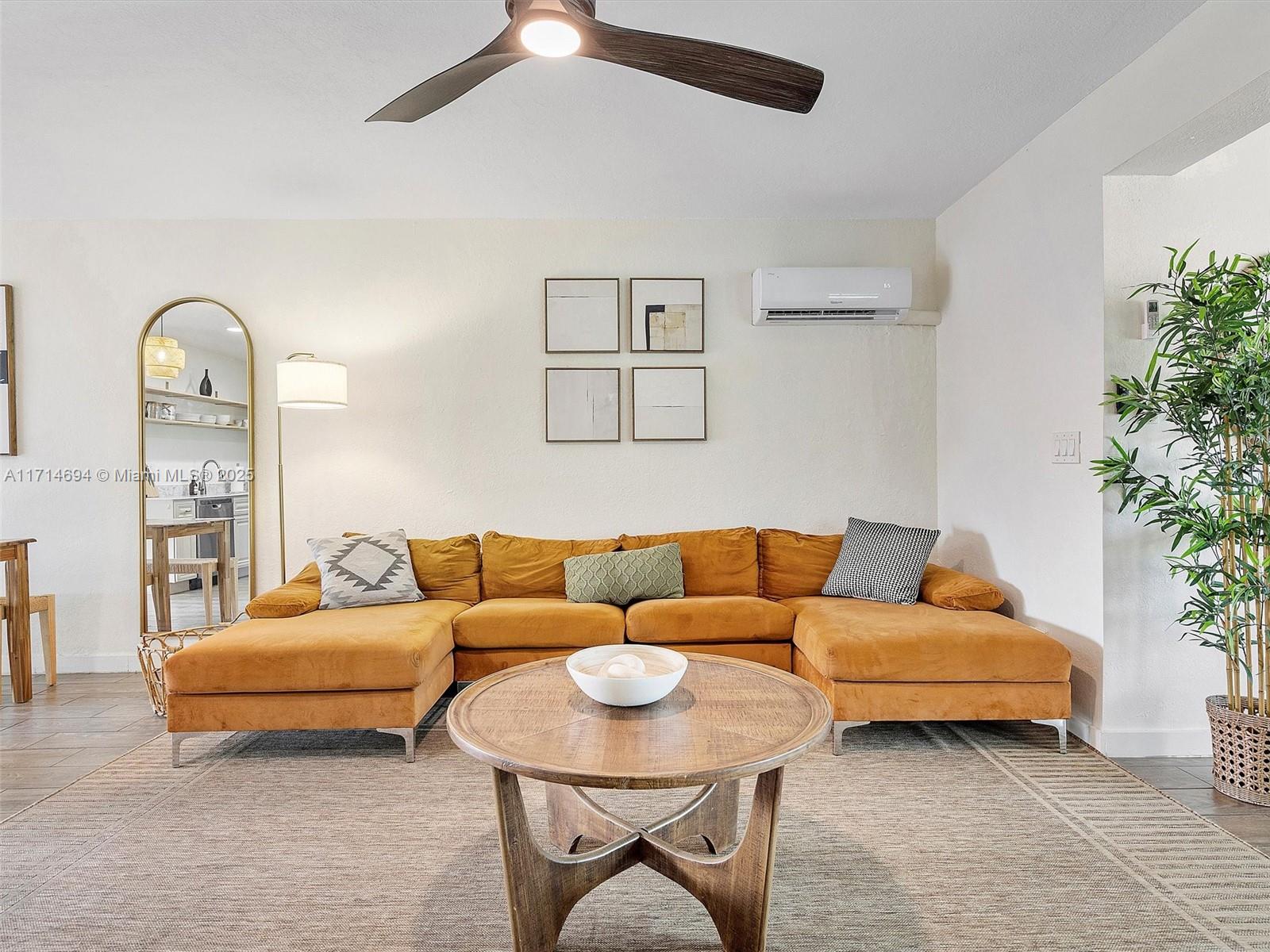 300 Southwest 23rd Street Fort Lauderdale, FL 33315 - Photo 11 of 43 a living room with furniture and a potted plant